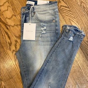 **KANCAN** size 7/27 mid rise skinny jeans